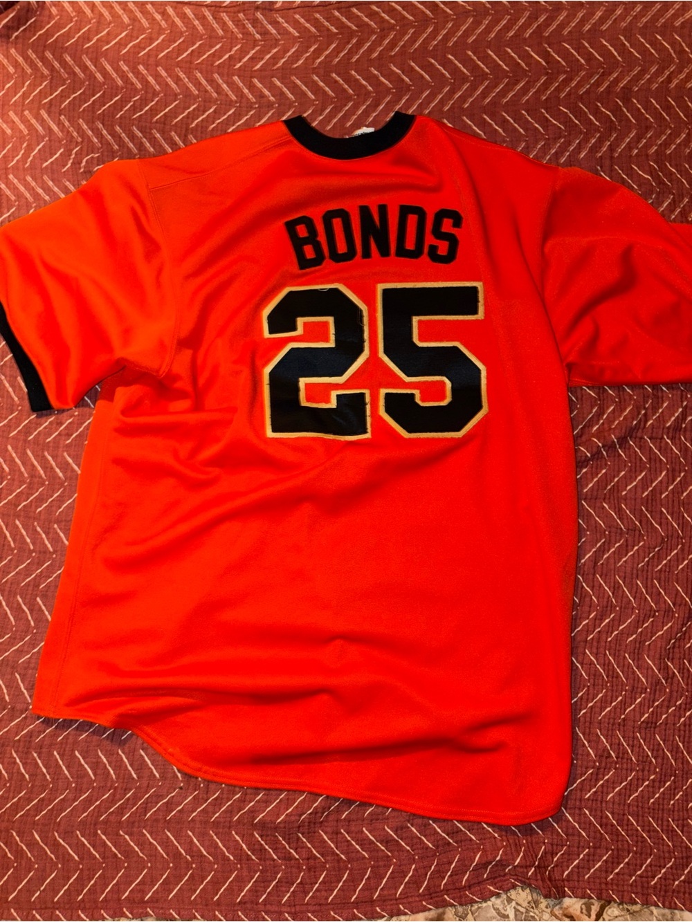 Men's Orange Short-Sleeve Athletic Jersey with Number 25